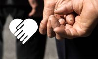 hands held in background photo and pictogram - hands held forming a heart